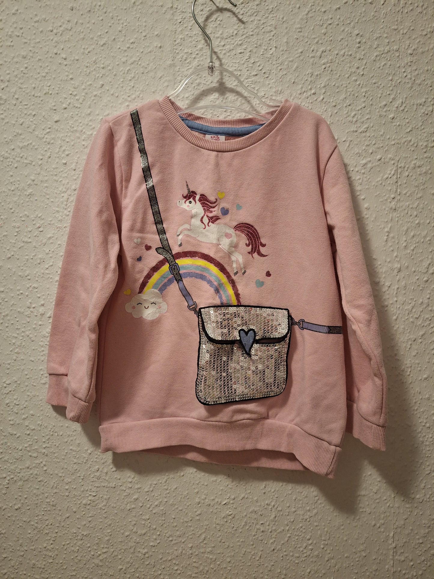 Pullover mit Paillettentasche 116