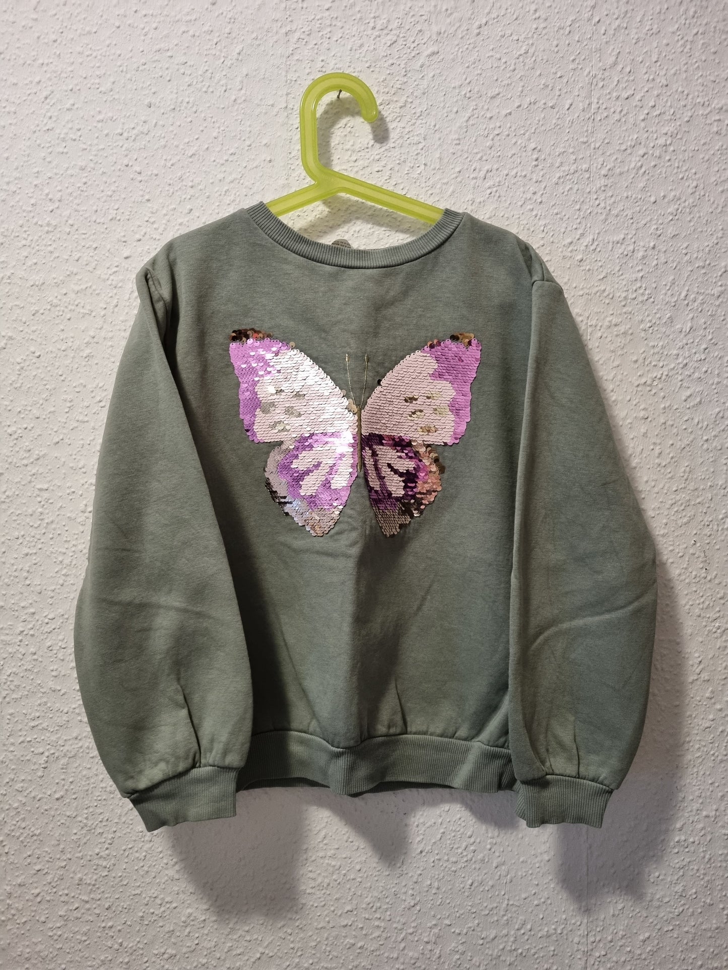 Pullover mit Paillletten Schmetterling 134/140