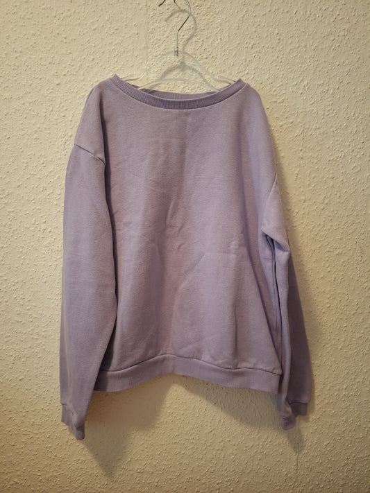 Lilafarbender Pullover