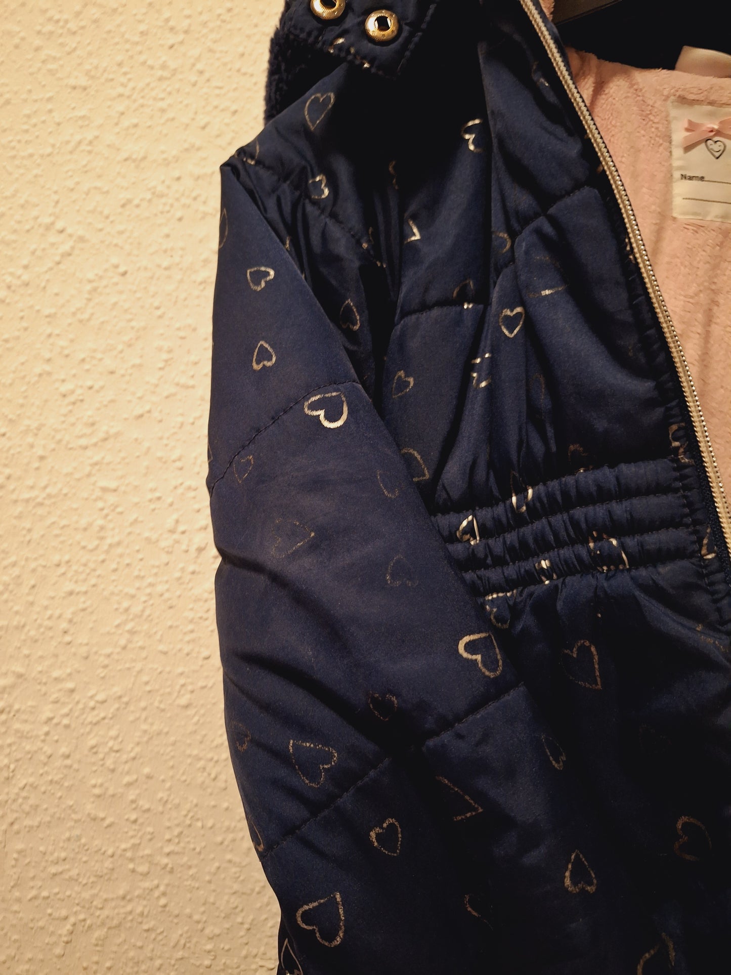 Winterjacke Dunkelblau mit Herzchen 122/128